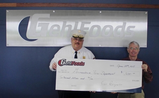Gehl Foods Donates Check to Germantown Fire Department